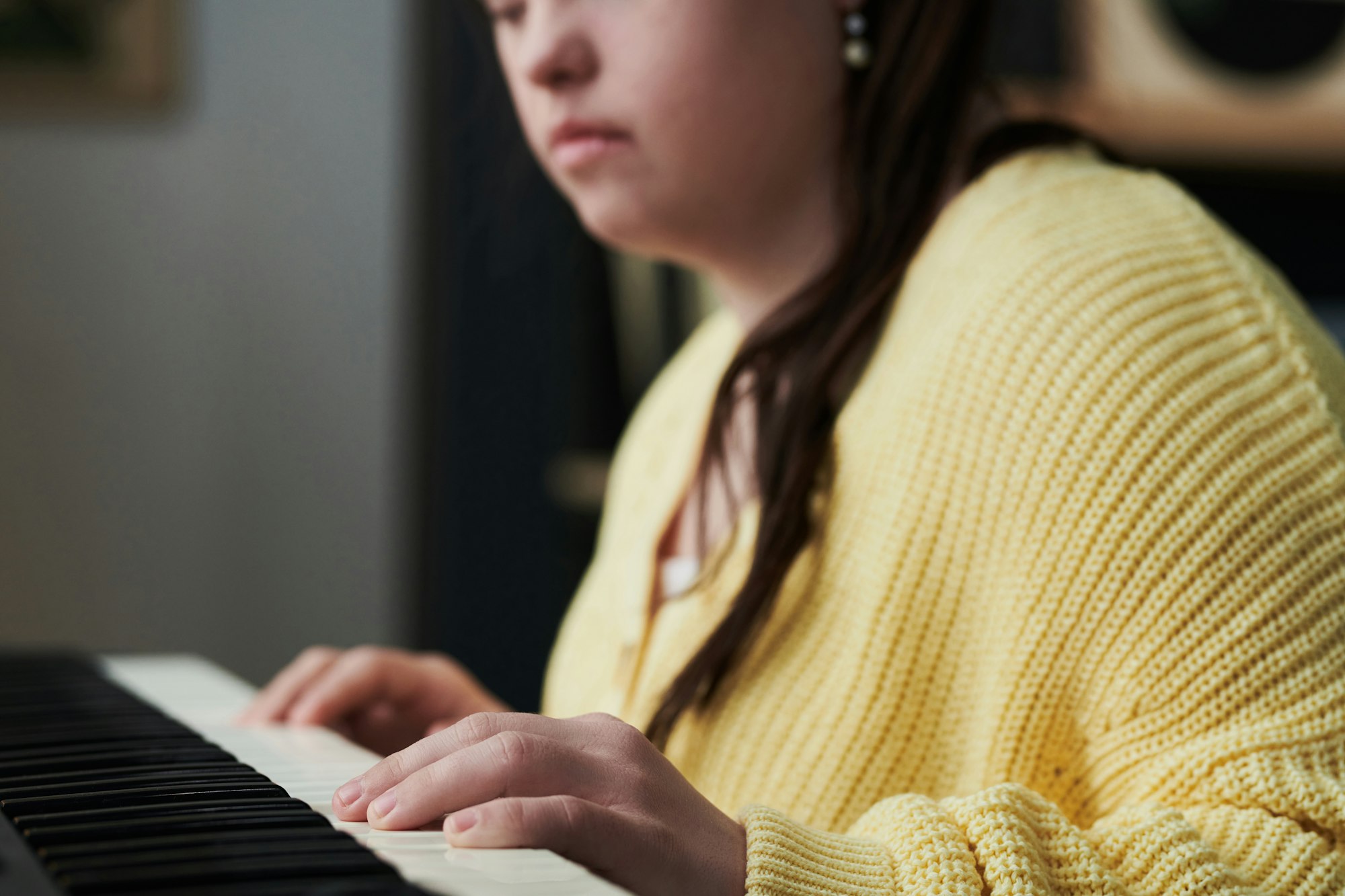 Pensive Woman With Disability Playing Piano